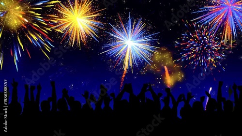 Crowd of people celebrating fireworks in the night sky.