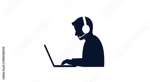 Man Wearing Headset Working on Laptop.