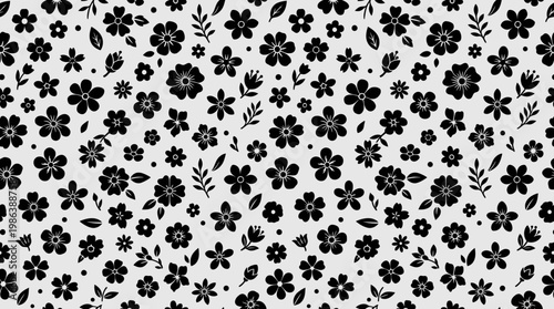 Monochrome floral repeating pattern with black and white petals and decorative motifs.