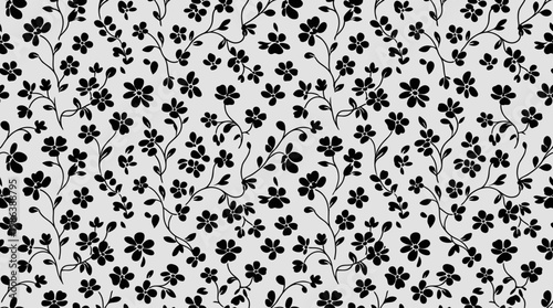 Seamless black floral pattern on white background with intricate vines and leaves design for textiles and graphics.