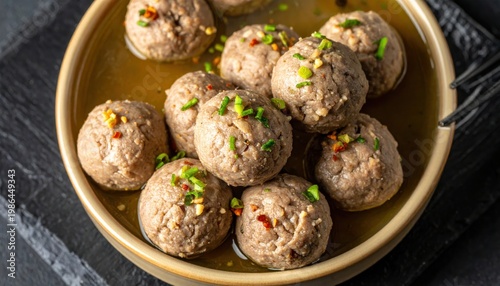 Tender Steamed Beef Meatballs Seasoned with Subtle Spices Presented Artfully on a Dish