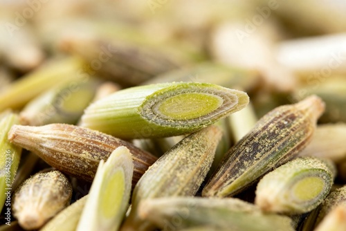 Close-up macro shot of dried fennel seeds, spice background