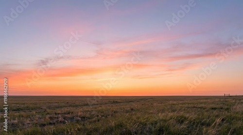 Colorful sunset clouds over a grassy field evening sky golden hour sky colors