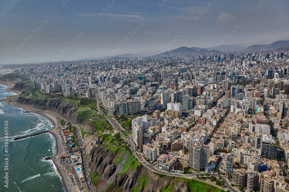 Fototapeta premium Aerial view of Miraflores and Costa Verde coastline in Lima, Peru, showcasing modern urban living along the Pacific Ocean with scenic cliffs, vibrant cityscape, and coastal landscapes.