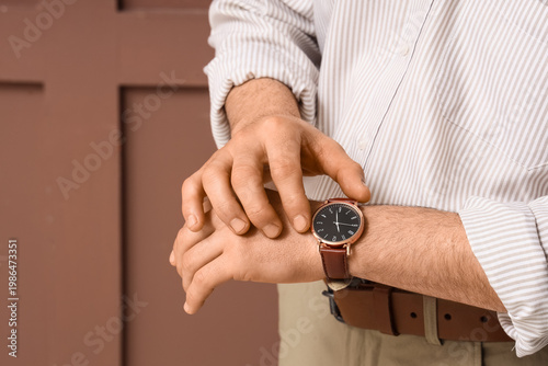 Man with stylish wristwatch...