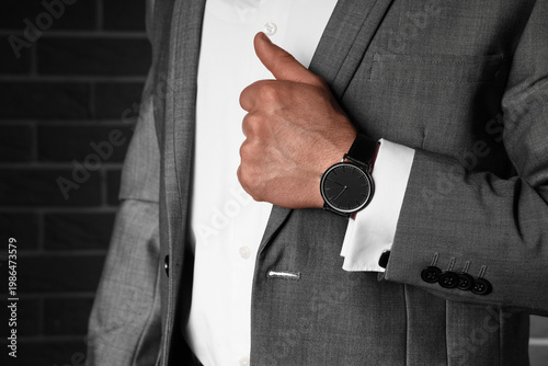 Businessman with stylish wr...
