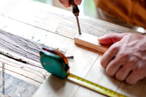 Schilderij op canvas Carpenter working with precision tools