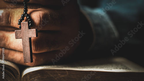Photos Hands clasped with rosary beads