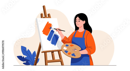 Female painter stands at an easel painting a colorful canvas in a bright studio.