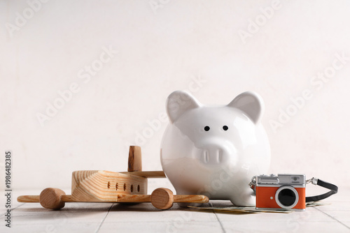 Piggy bank with money, came...
