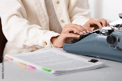 Female screenwriter using v...
