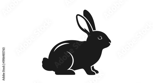 Silhouette of a Rabbit Sitting Facing Left, an Icon Representing Easter, Spring, and Pets, with a Simple, Clean Design