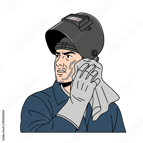 Tired Welder Wiping Sweat and Grime from Face with Cloth, Wearing Protective Gear