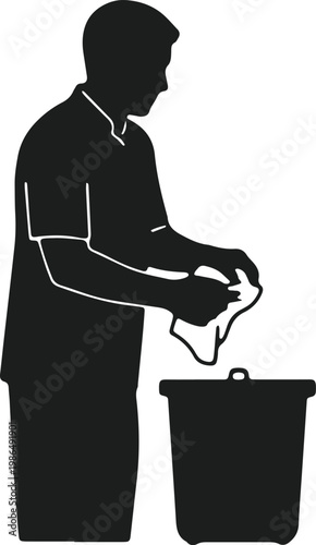 Man throwing paper into trash can