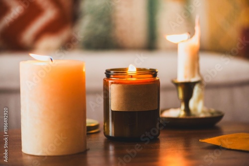Bild auf Leinwand Cozy candles create warm ambiance