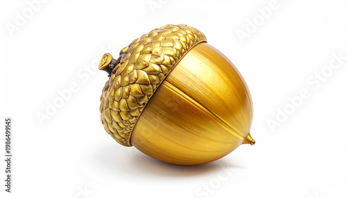 Shiny golden acorn isolated on a clean white background with subtle shadow