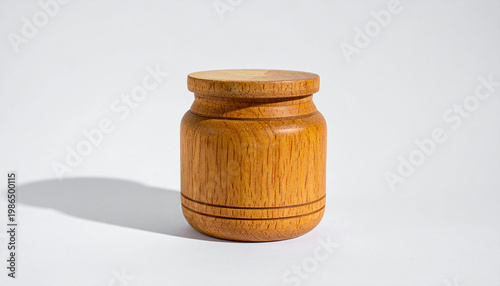 Wooden storage container with lid and prominent wood grain texture