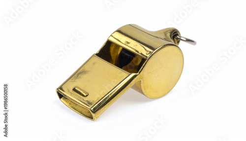 A bright golden whistle with a key ring presented on a clean white background