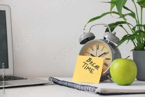Alarm clock and sticky note...