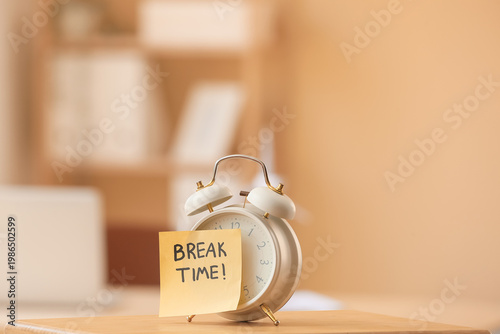 Alarm clock and sticky note...