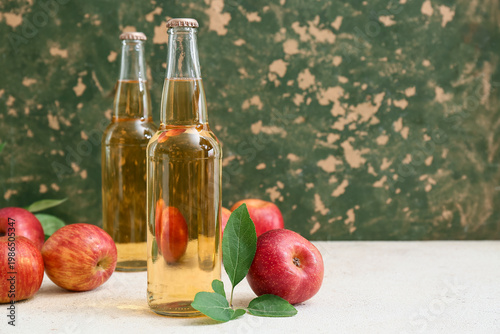 Bottles of fresh apple cide...
