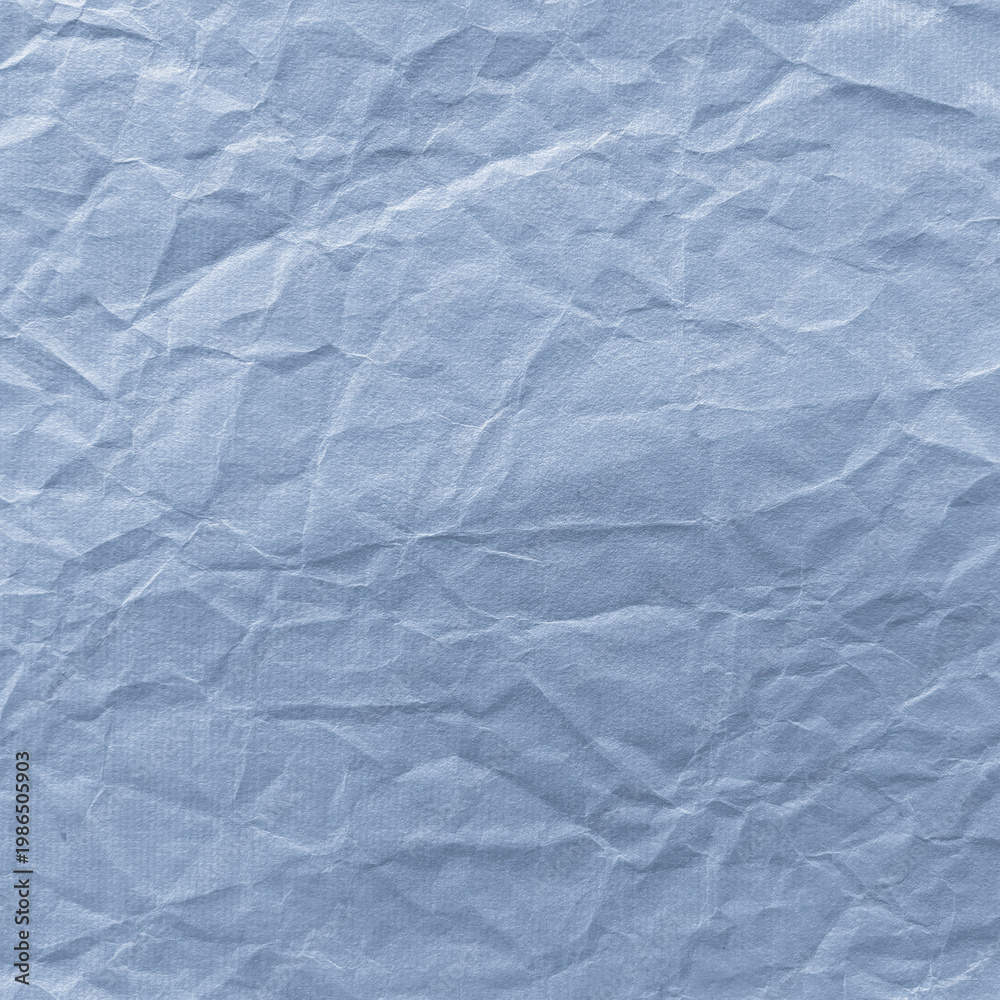 Fototapeta premium Textured blue crumpled paper background