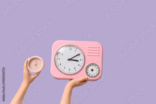 Female hands holding wall a...