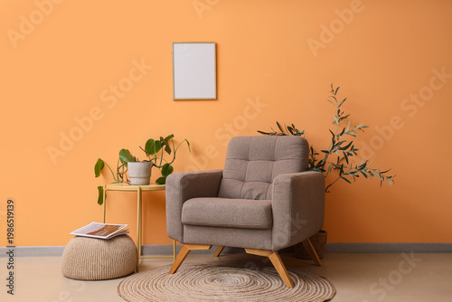 Armchair, pouf with magazin...