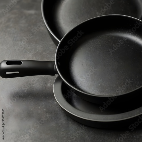 Close-up of non-stick pan surface, clean kitchen background, minimal composition