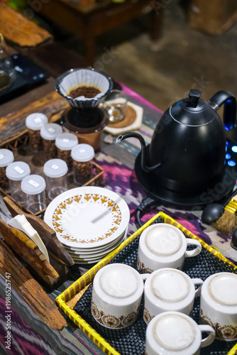 Fotografie Pour-over coffee brewing using Indonesian beans, with dripper, paper filter, and gooseneck kettle for precise extraction