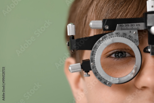 Little boy in optical trial...