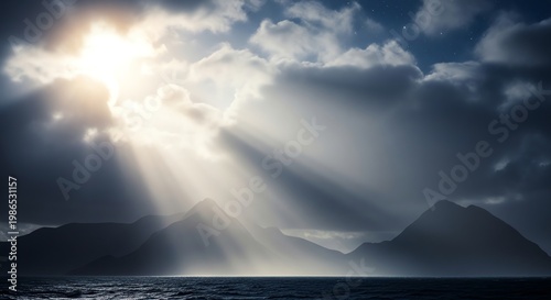 Mountains and ocean with sun rays through clouds