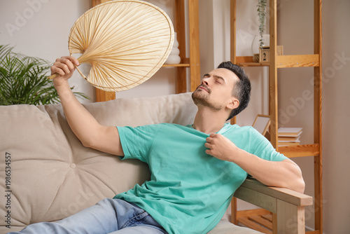 Young man with dried palm l...