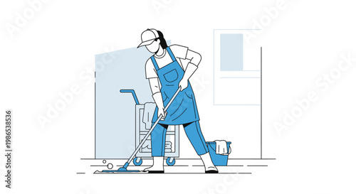 Woman wearing blue overalls working.