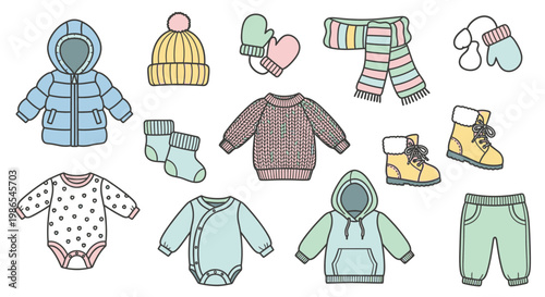 Baby clothes and accessories laid out 1.