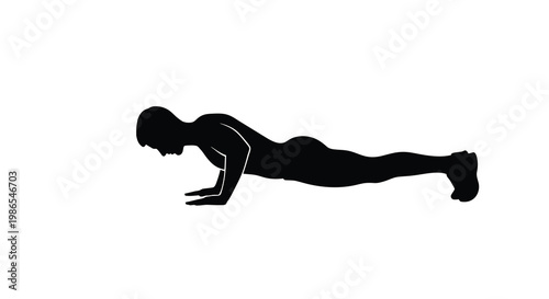 Silhouette of a person performing a push up exercise in a stark setting