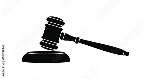 A black silhouette of a gavel resting on a sound block