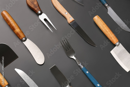 Set of knives and fork on b...