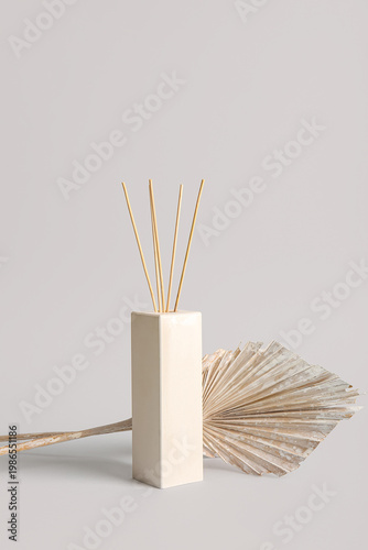 Reed diffuser on grey backg...