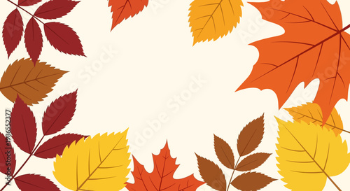 Colorful autumn leaves on beige background.