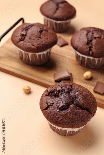 Tasty chocolate cupcakes on...