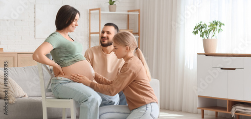 Young happy pregnant woman ...