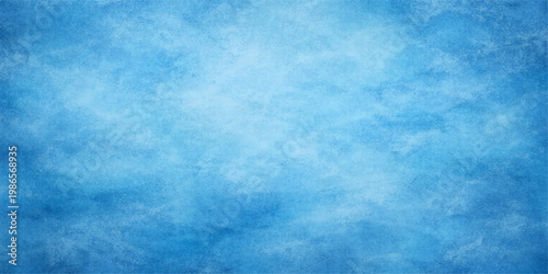An abstract blue grunge texture evokes a bright summer day with light clouds drifting across a patterned paper sky
