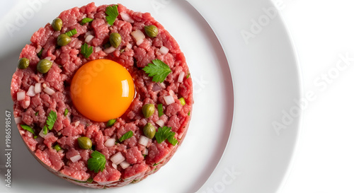 Raw beef tartare with egg yolk.