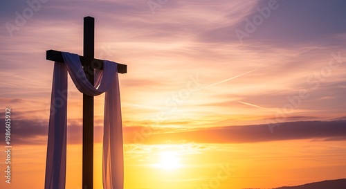 Christian Cross with White Cloth Against a Dramatic Sunset Sky.