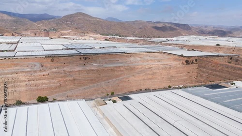 mine earth mining industry greenhouse plastic sea mountain texture food intensive farming drone dig - Andalusia, Spain - 2025