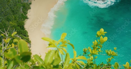 Top down view of crystal clear turquoise ocean water at Nusa Penida Bali Kelingking Beach