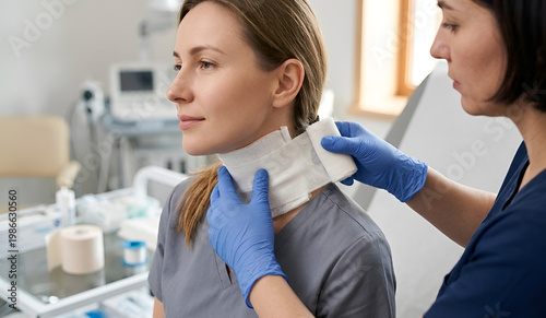 Patient receiving neck treatment in a clean healthcare setting.