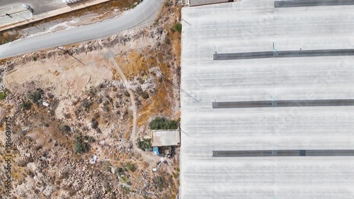 industrial border roof industry plastic sea greenhouse dry intensive farming agriculture invernaderos plan drone travel nature - Andalusia, Spain - 2025