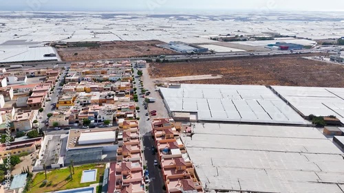 urban plastic sea greenhouse city industry town plastic sea industrial border road housing building drone home landscape house - Andalusia, Spain - 2025